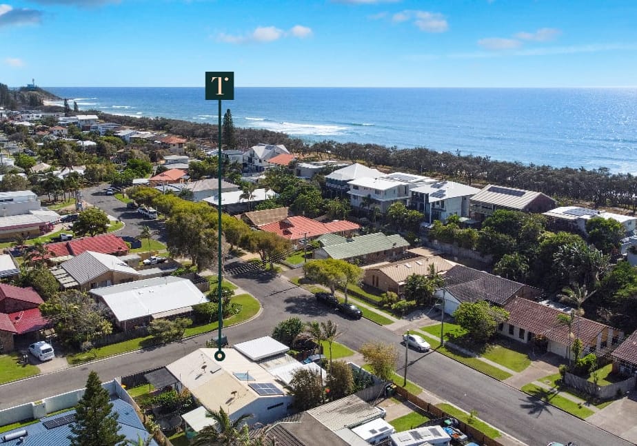 Vast potential with seaside duplex on two titles.