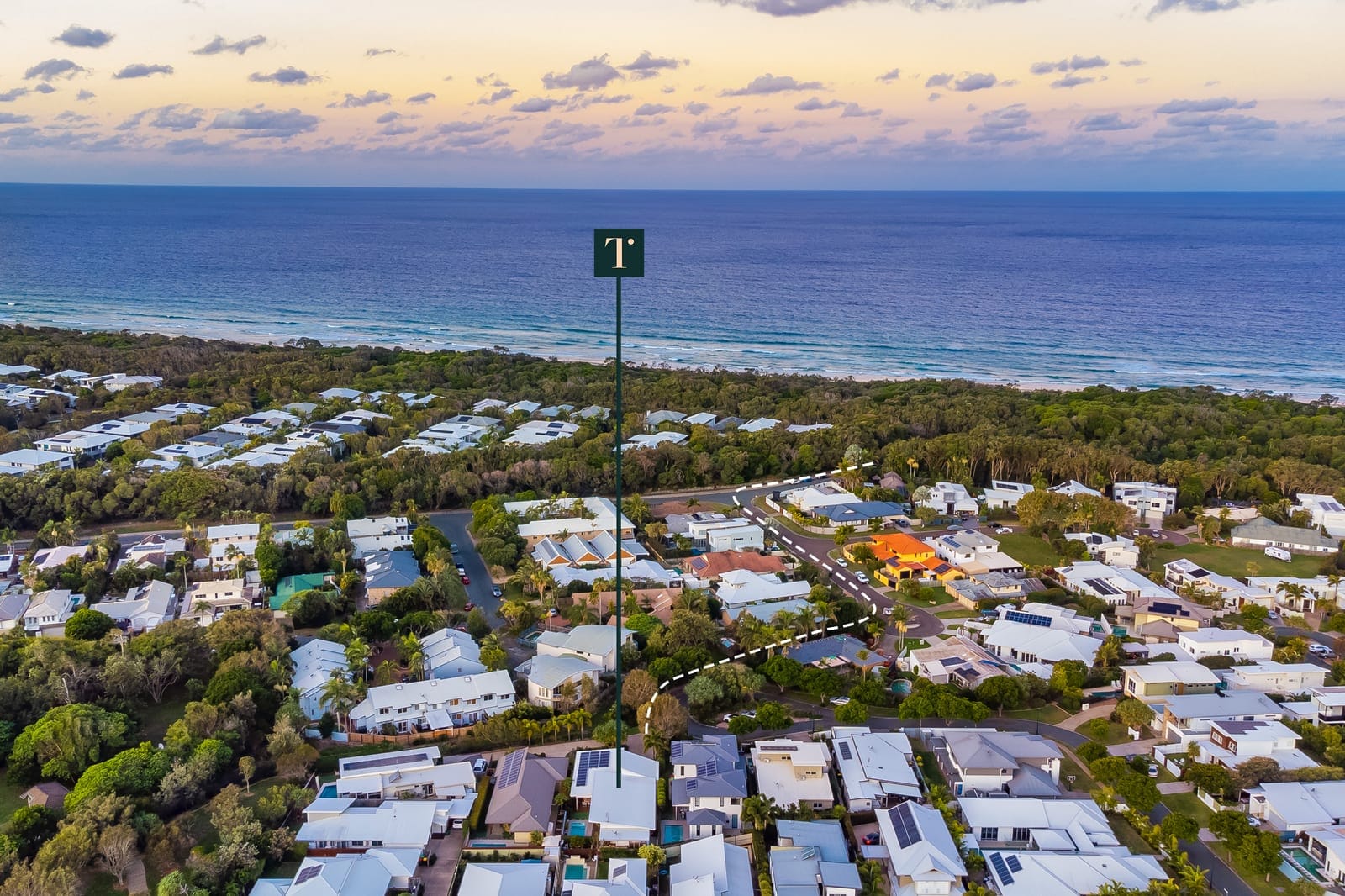 Immaculate Single Level Beachside Living in Private Enclave