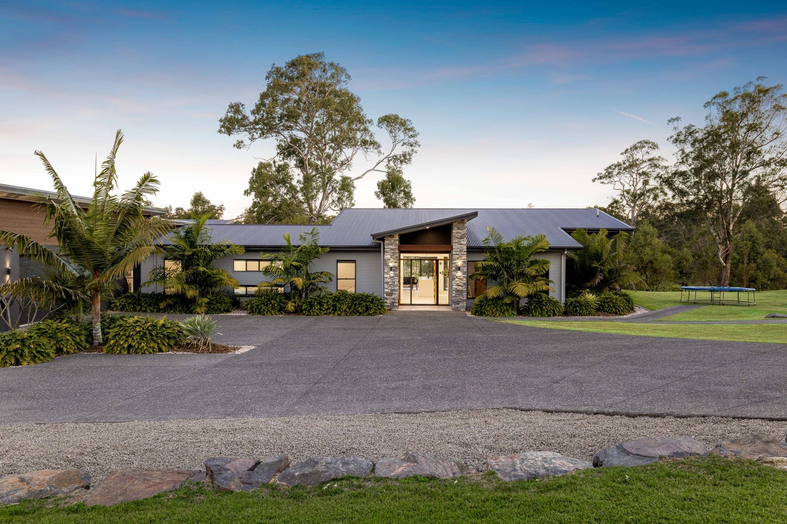 Single level, Executive acreage living with impressive shed!