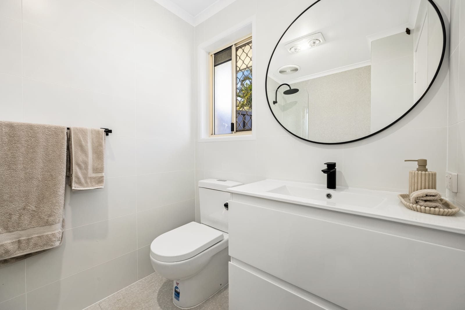 Stylish Coastal Duplex Boasting Modern Comfort And Convenience