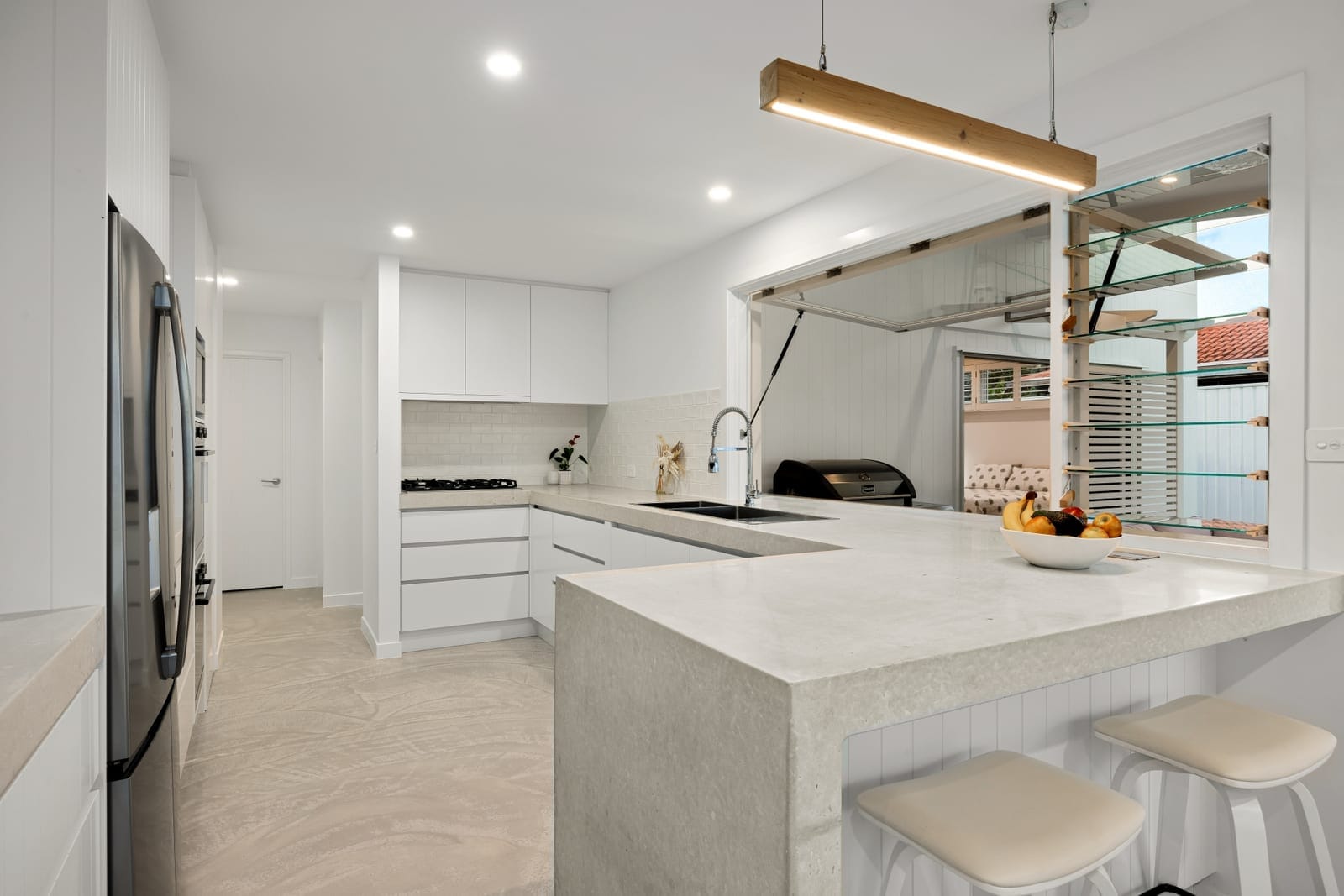 Contemporary retreat in desirable beachside locale!