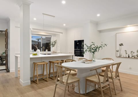 Luxe Sunshine Stunner: Dual Street Access, Dual Living