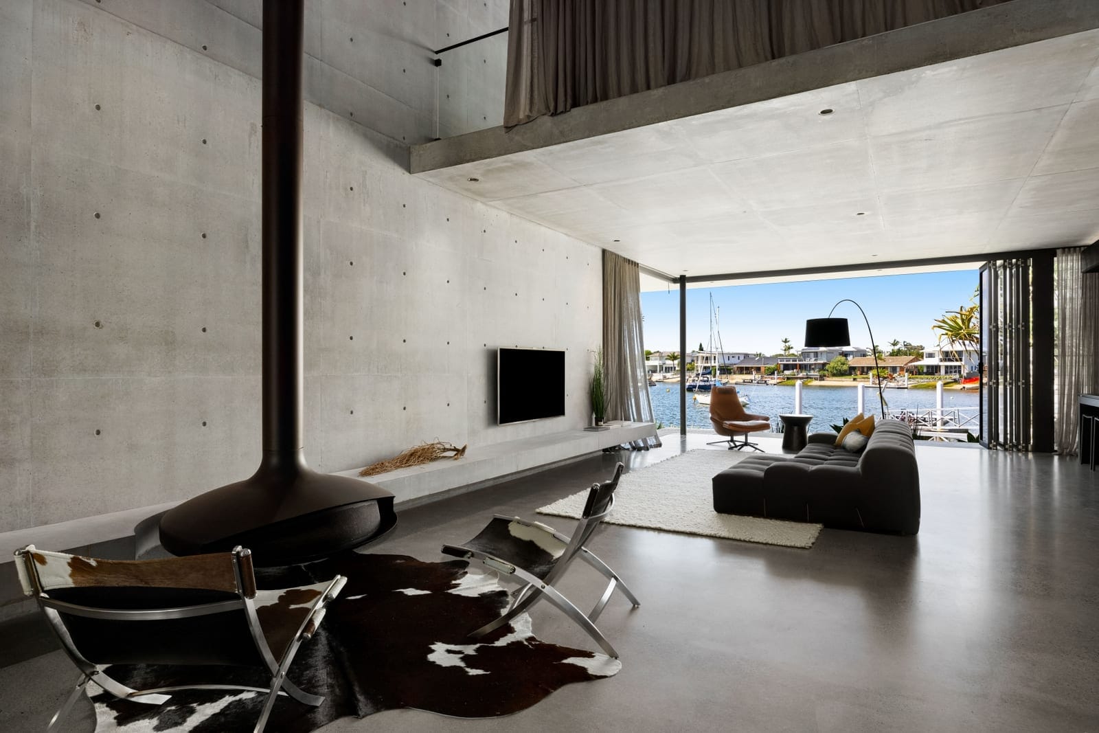 Luxe Riverfront Living: High-End Build, Deep Water Access