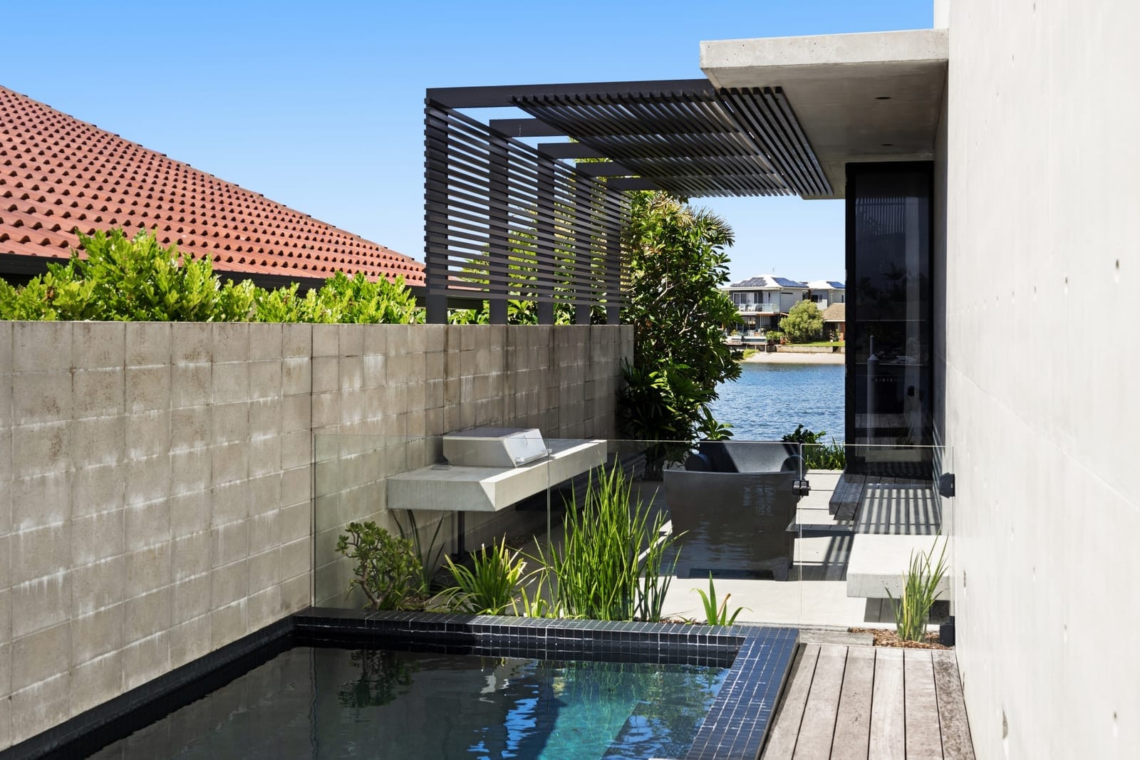 Luxe Riverfront Living: High-End Build, Deep Water Access