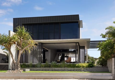 Luxe Riverfront Living: High-End Build, Deep Water Access