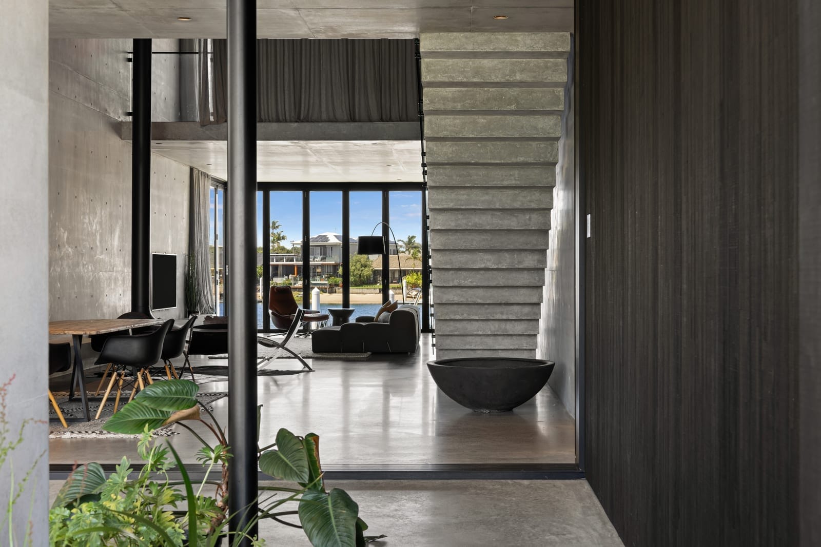 Luxe Riverfront Living: High-End Build, Deep Water Access