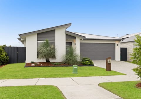 Stunning Raked High Ceilings + 2 Living + Ducted + Solar. Time to Start Packing & Get Excited!