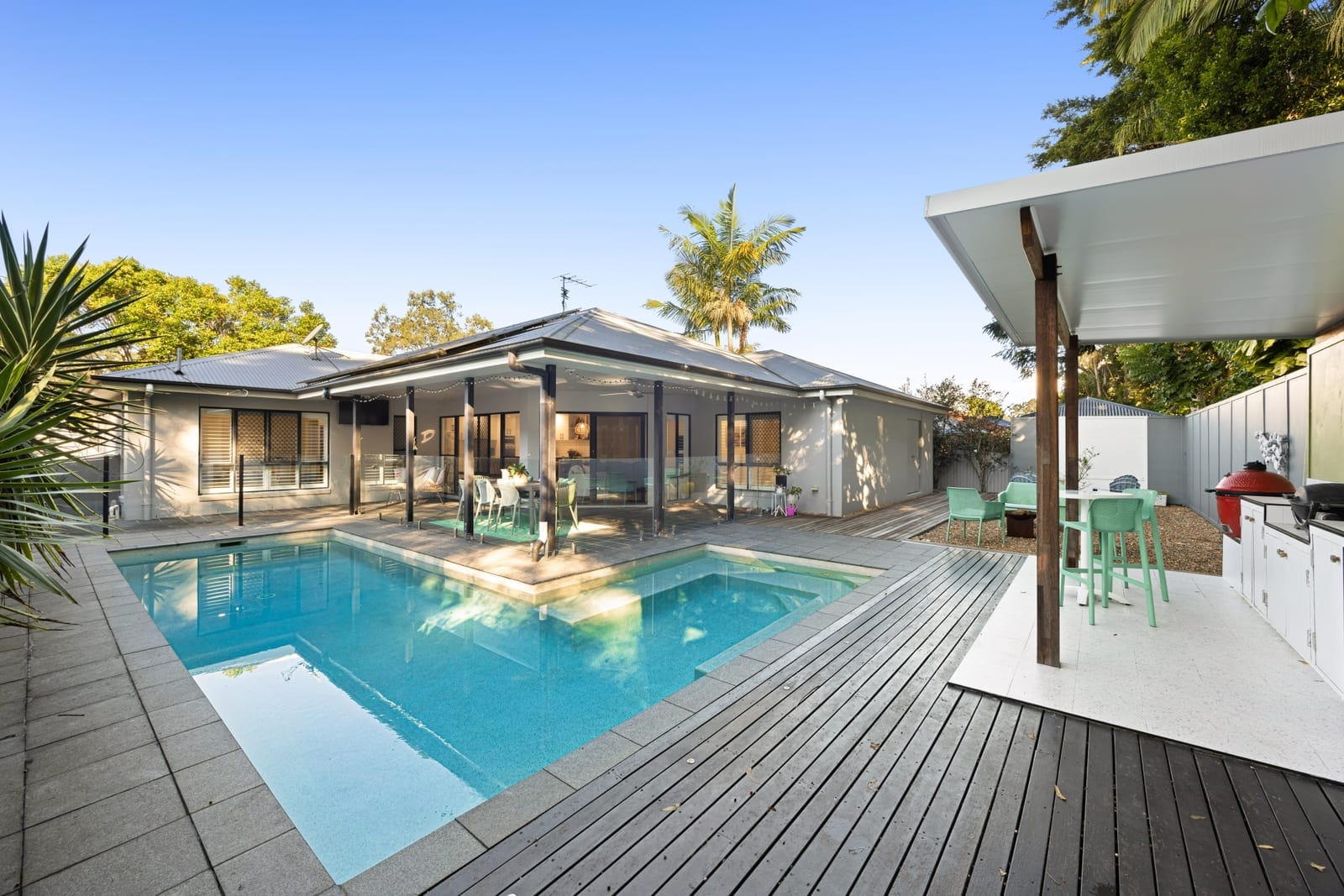 Contemporary Family Oasis with Reserve Backdrop