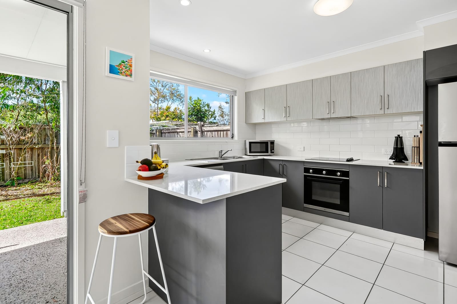 Low-Maintenance Living Minutes from Beaches & University