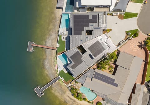Luxury Riverfront Living: Brand New Contemporary Masterpiece