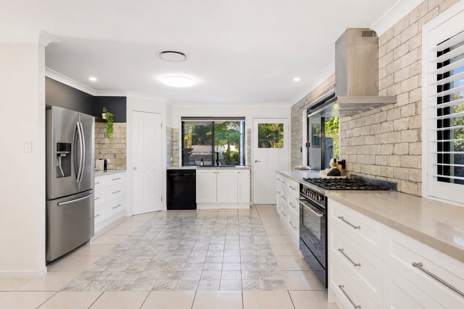 SOLD BY JAMIE VIBERT & NAJ ELSAYED