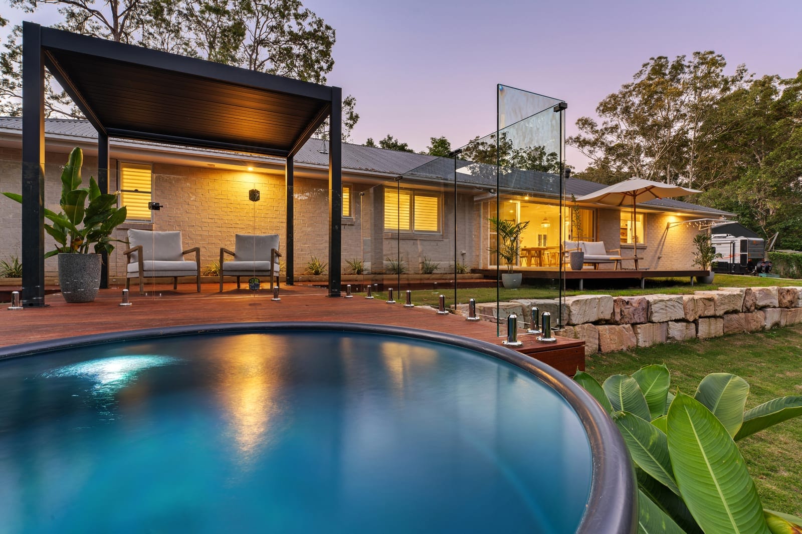 Acreage Living Redefined - Near-New Dual Living on 3.8 Acres