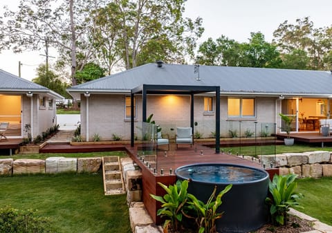 Acreage Living Redefined - Near-New Dual Living on 3.8 Acres