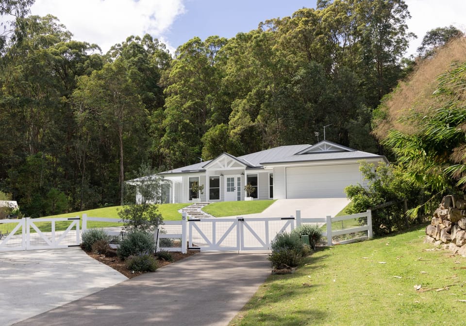 Hamptons Charm Surrounded by Beautifully Landscaped Grounds
