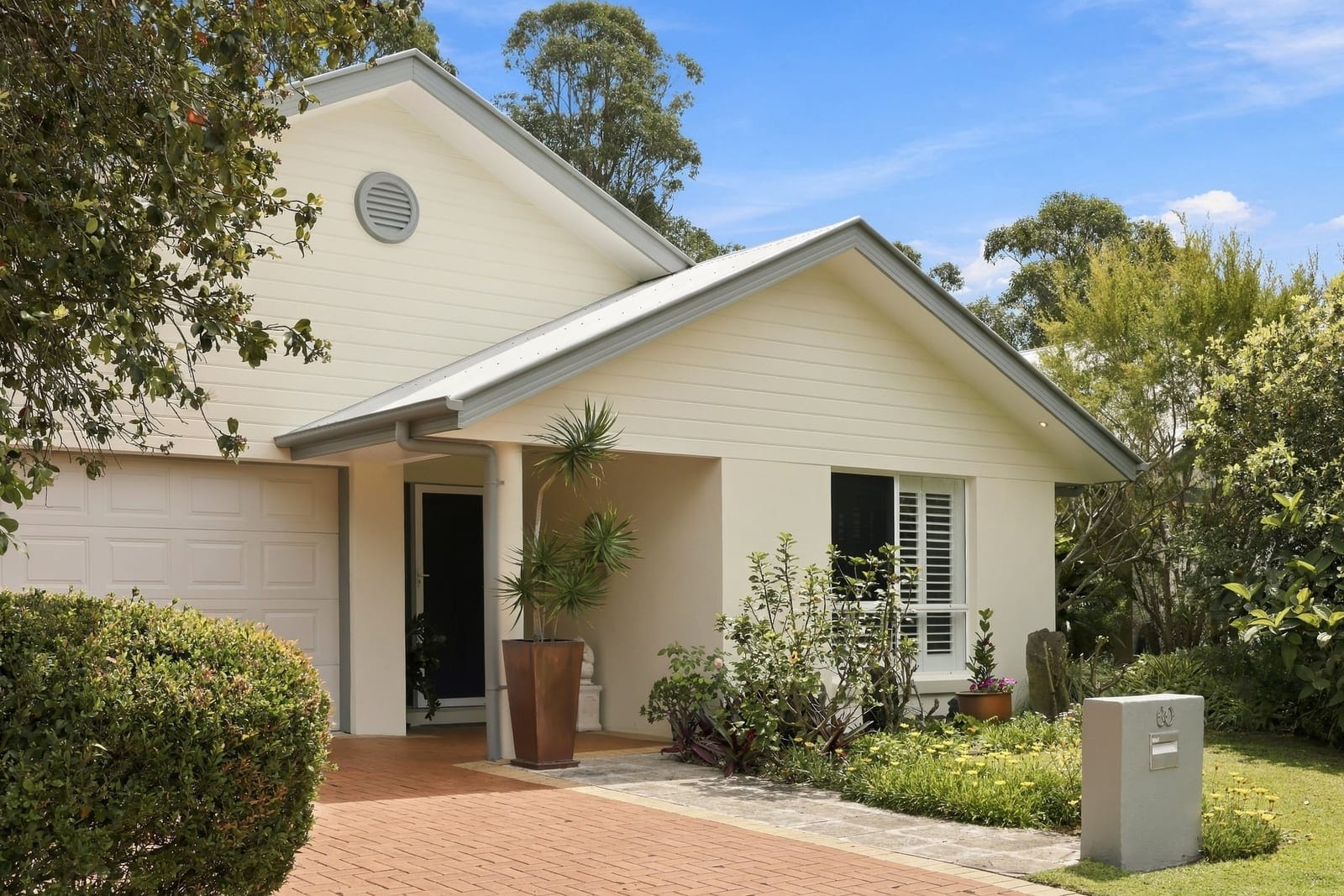 Cathedral Ceilings, Tranquil Gardens & Twin Waters Living