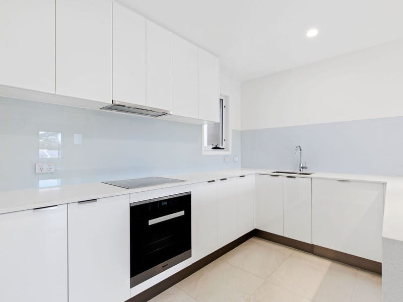 Brand New, High-End Beachside Living!