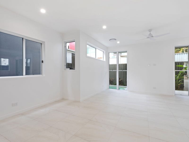 Brand New, High-End Beachside Living!